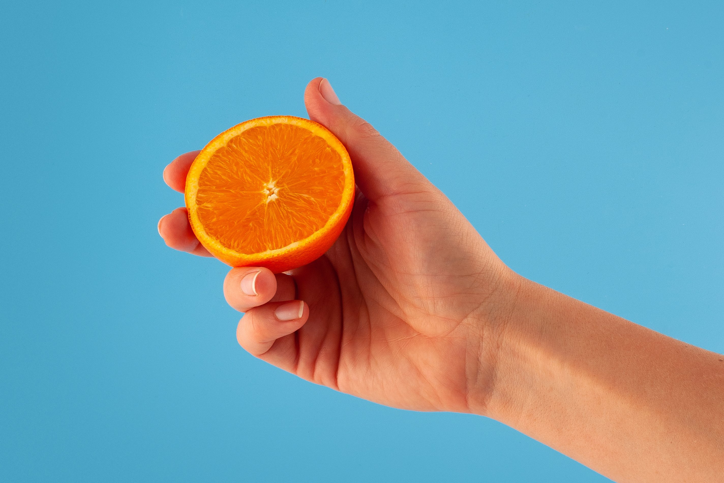 Orange in hand